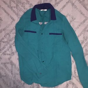 Teal/Green button down with navy blue detailing.